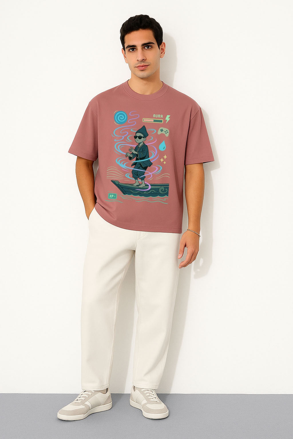 Man wearing a oversized aura farming graphic t-shirt with a colorful design on a plain background