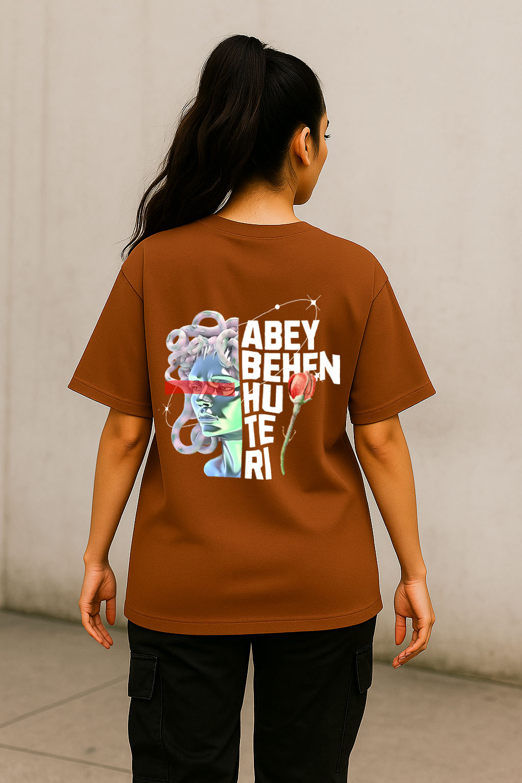 Rear view of BANKAZ brown oversized graphic t-shirt for women with bold Hindi print – streetwear vibe