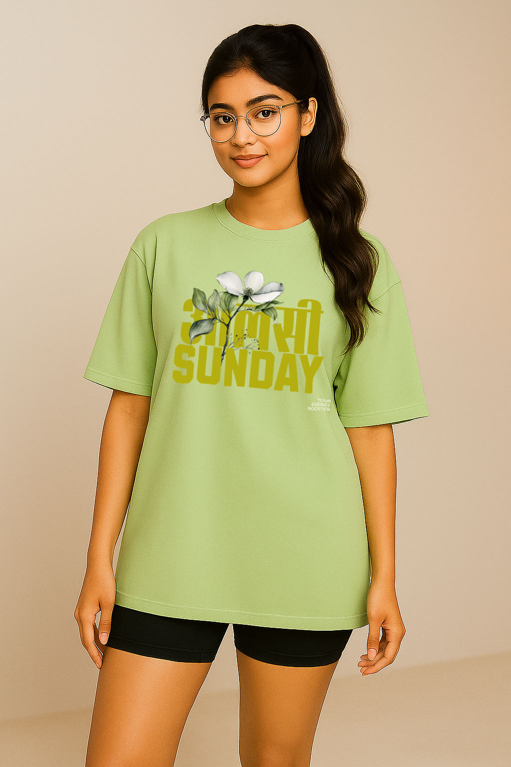 Front pose of girl wearing Hindi quote green oversized t-shirt from BANKAZ – desi streetwear vibe