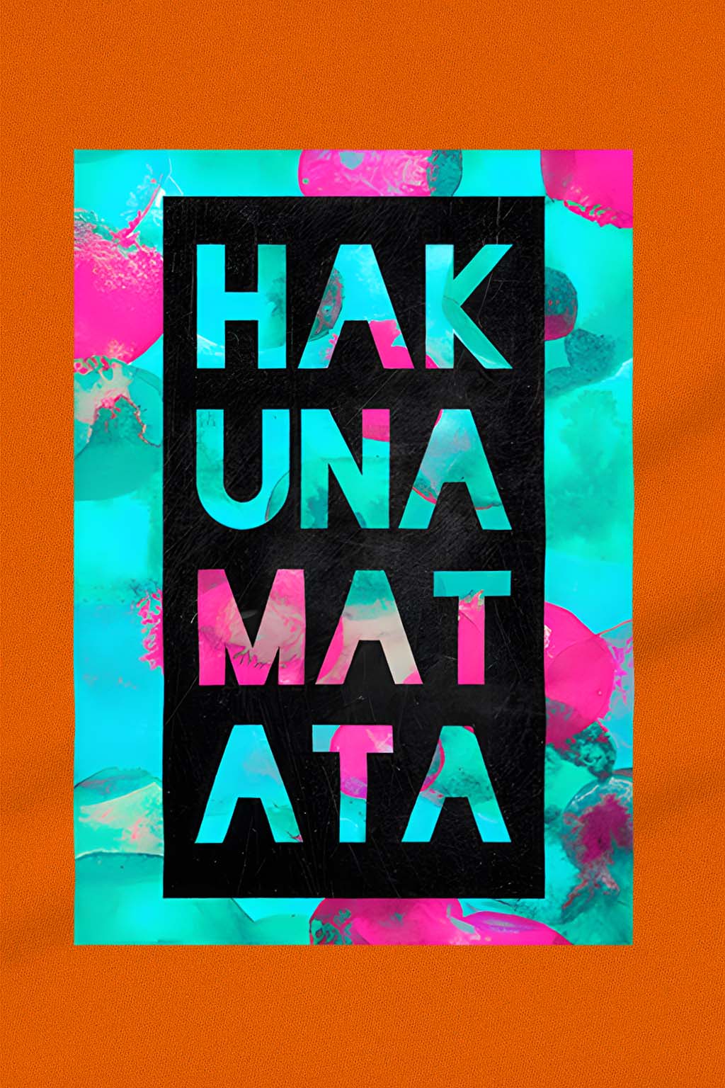 Close-up of Hakuna Matata colorful graphic print on orange cotton t-shirt – streetwear quote design