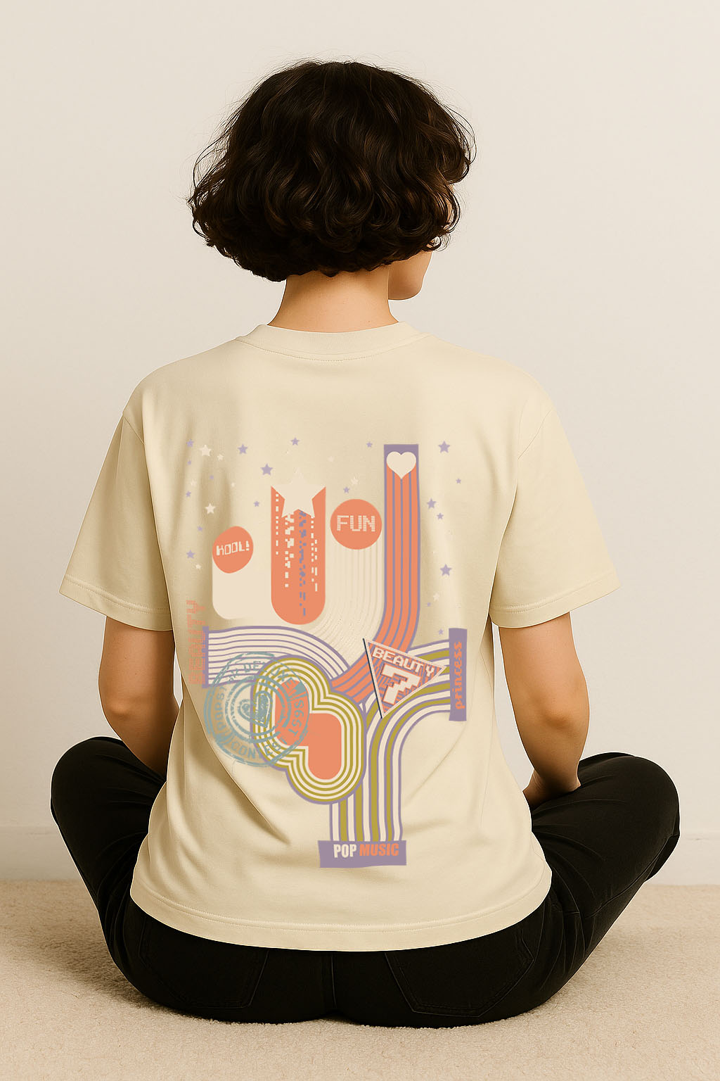 Oversized women’s t-shirt in off-white with colourful abstract back design – stylish Gen Z fashion