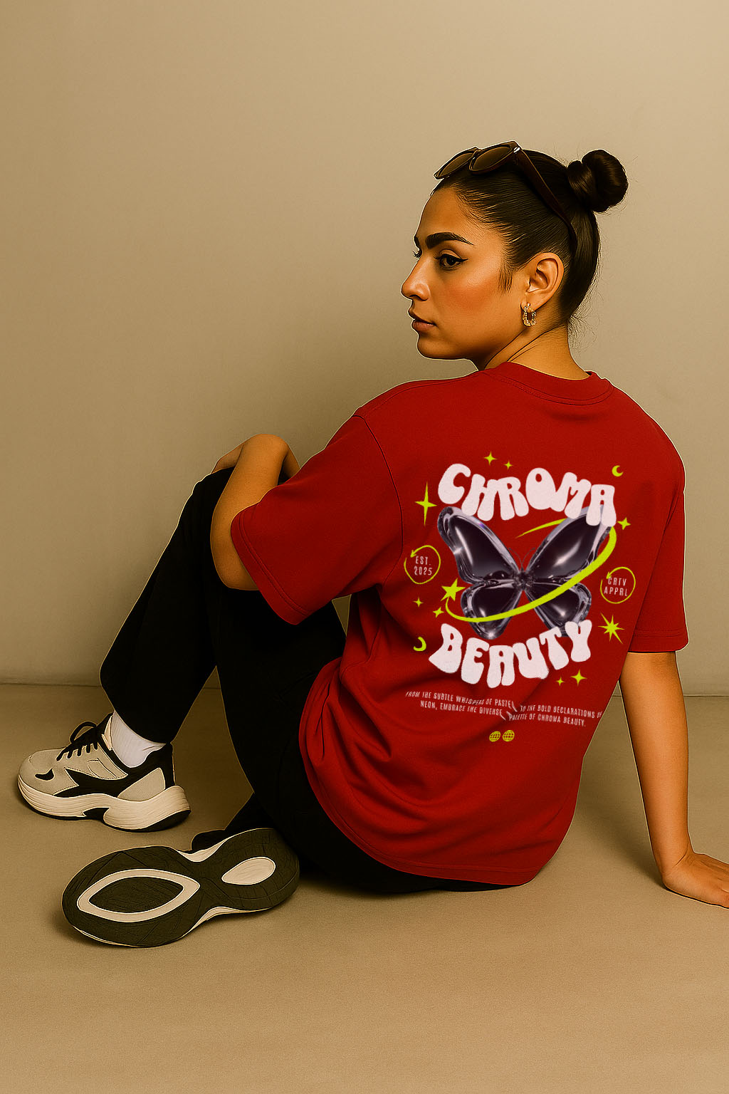 Back view of red oversized t-shirt for women with "Chroma Beauty" butterfly graphic – neon aesthetic streetwear vibe