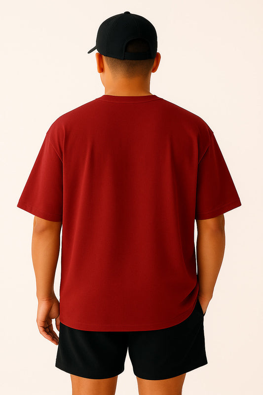 Back side of BANKAZ red oversized t shirt with relaxed fit, no visible print