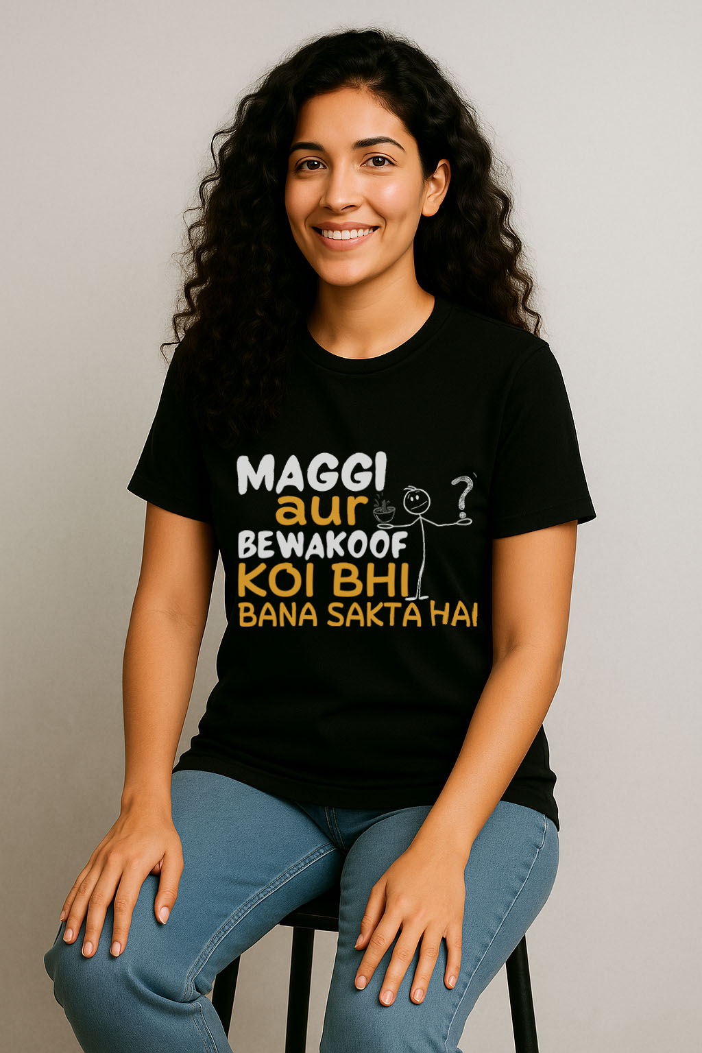 Seated pose in black cotton t-shirt for women with humorous Hindi quote – ideal for Maggi fans
