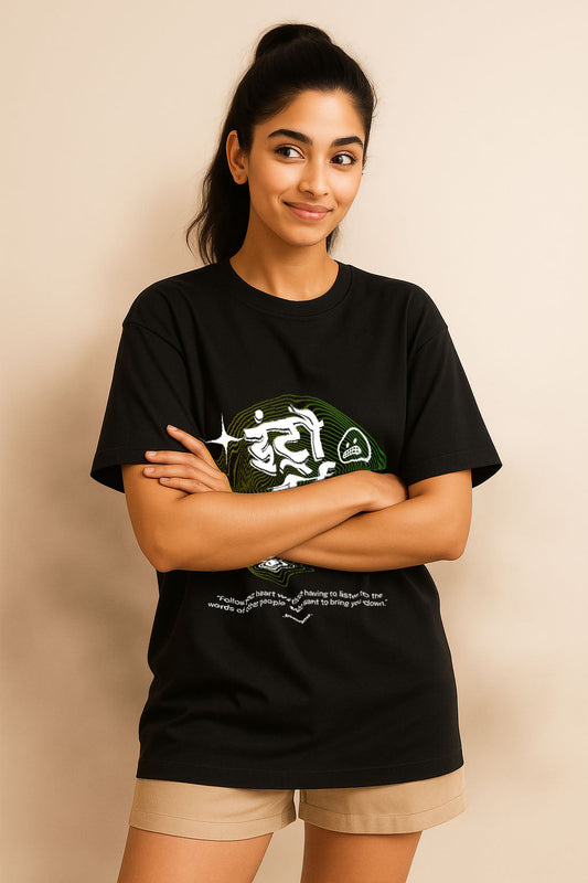 Black oversized introvert t-shirt for women – standing pose, showcasing streetwear fit and graphic
