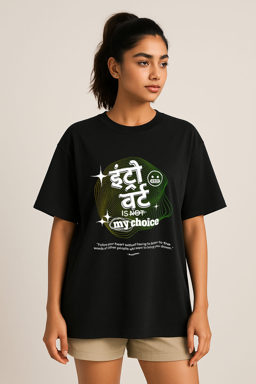 Black oversized t-shirt for women – relaxed pose with bold Hindi introvert quote and neon detail