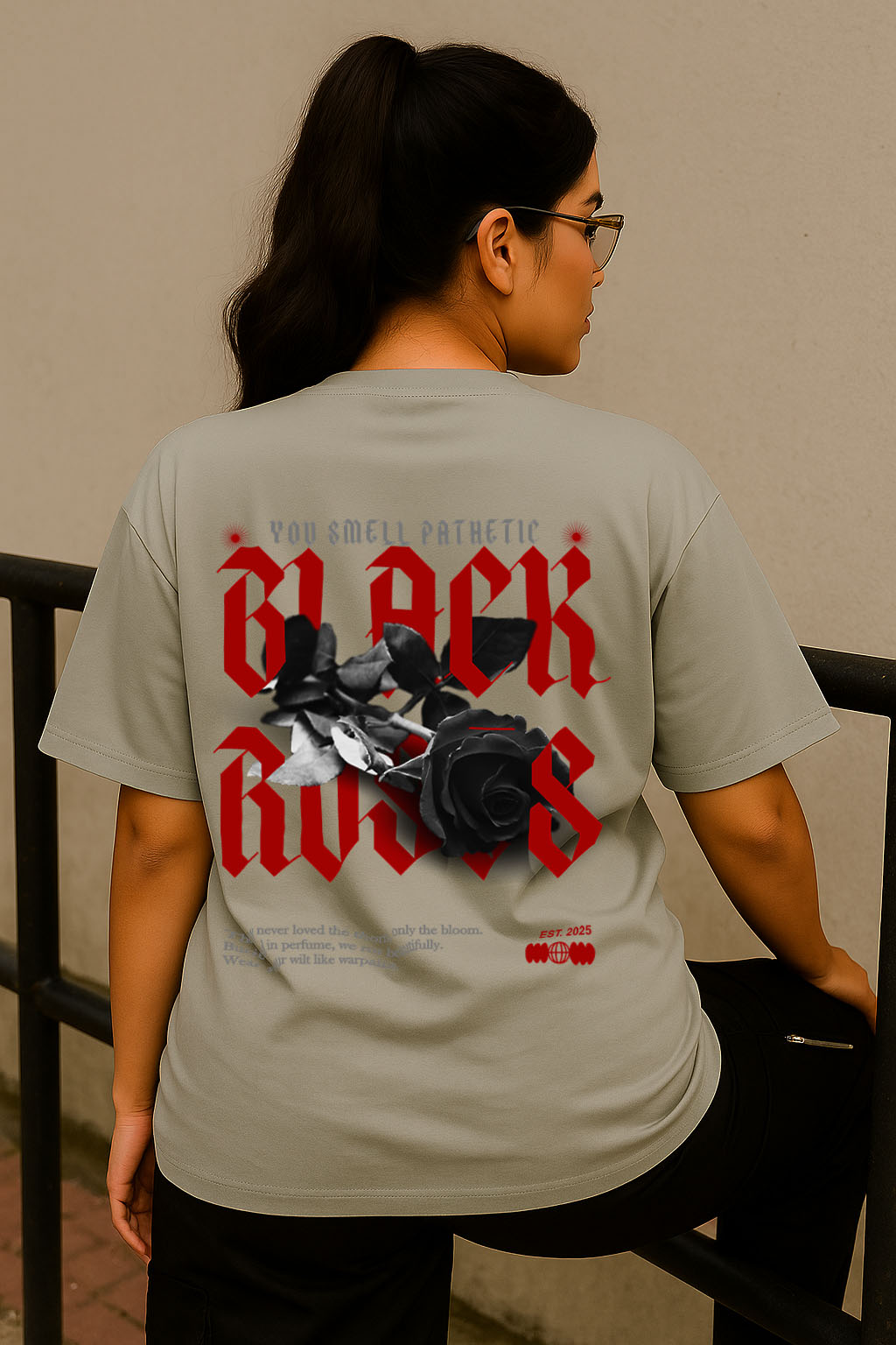 Rear angle of black rose gothic graphic t-shirt for women – oversized fit by BANKAZ