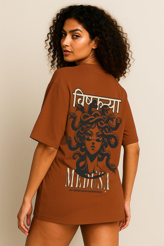 Side back angle of women's brown oversized Medusa t-shirt with artistic Vishkanya snakehead print