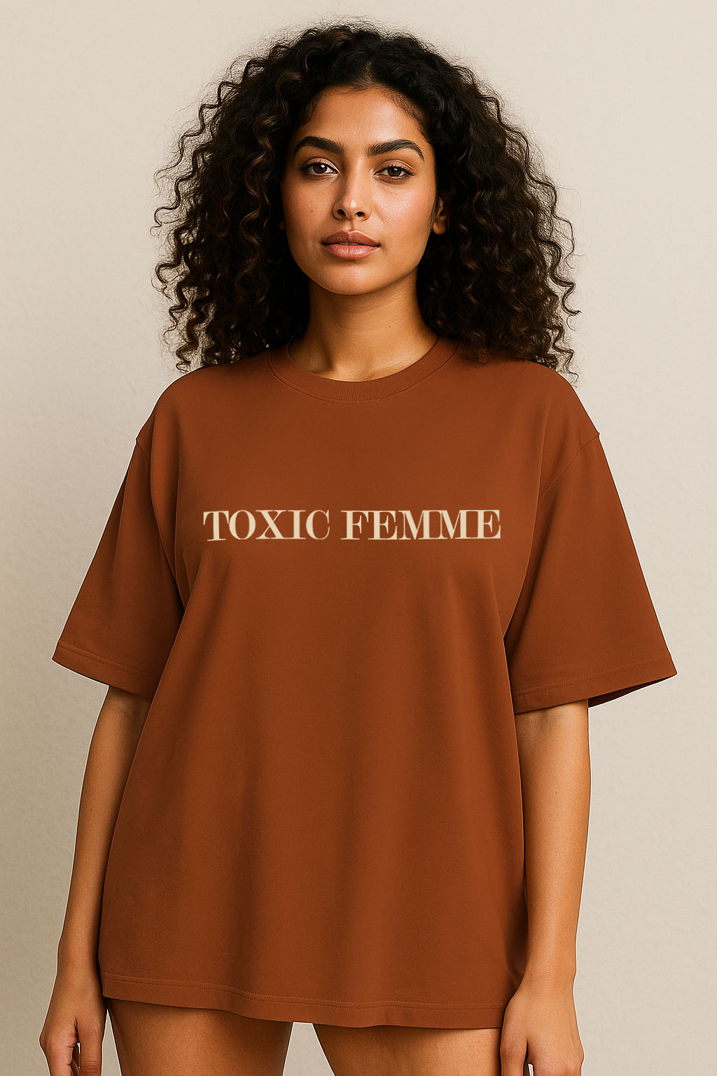 Women’s brown oversized t-shirt front – clean bold "Toxic Femme" statement print for Gen Z fashion