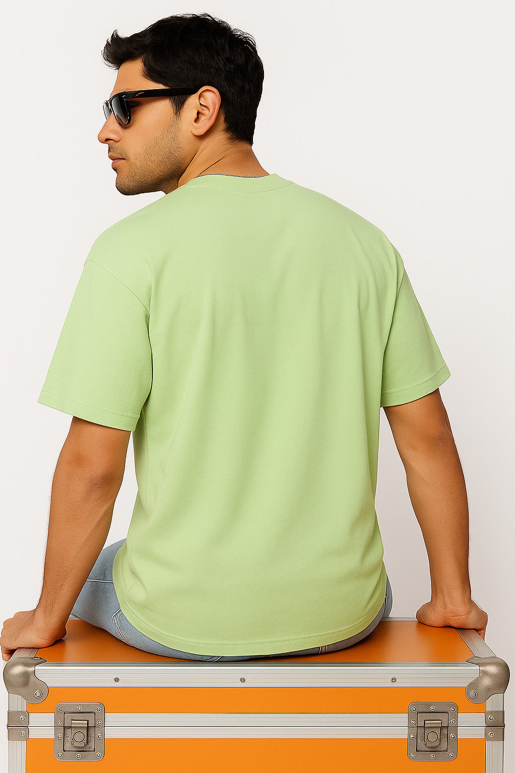 Back view of BANKAZ gothic black label t shirt in green oversized fit with bold central graphic