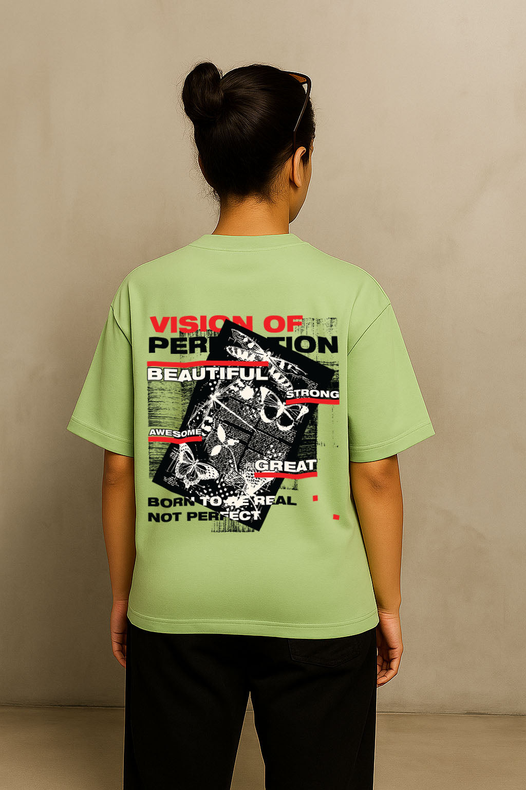 Green Oversized Butterfly T-Shirt for Women – Back View with Graphic Quote "Born to be real, not perfect"