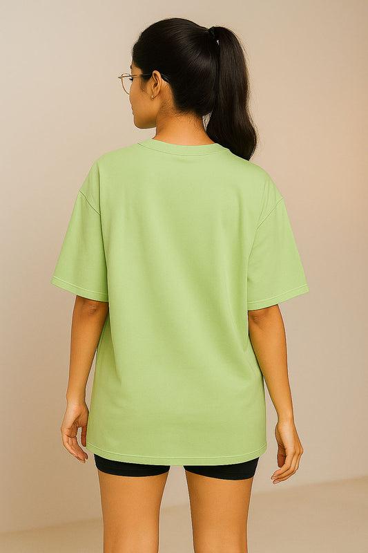 Back view of BANKAZ green oversized Hindi t-shirt for women – relaxed fit desi streetwear