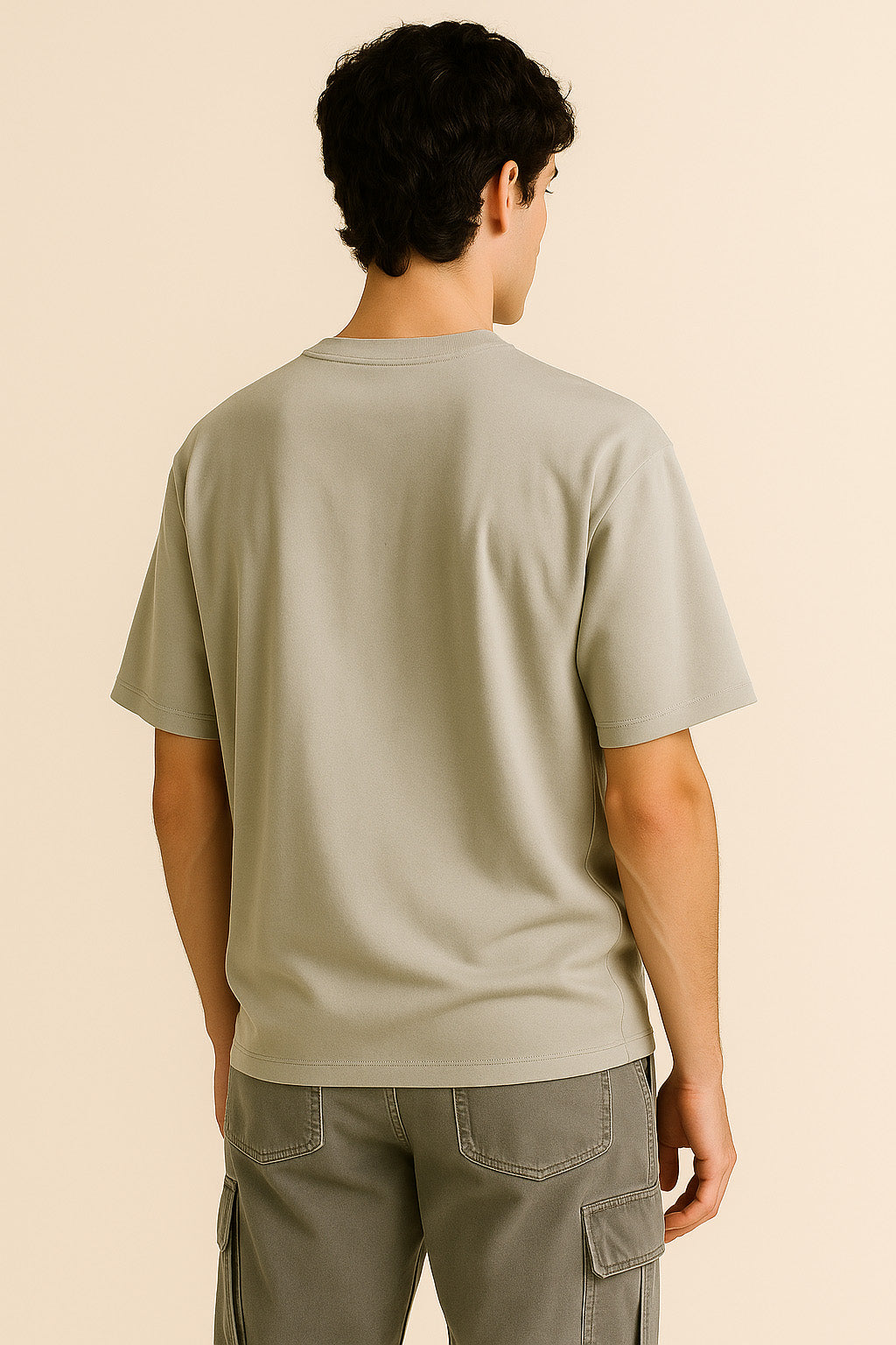 Rear view of BANKAZ grunge t shirt in grey oversized fit, minimal clean back style