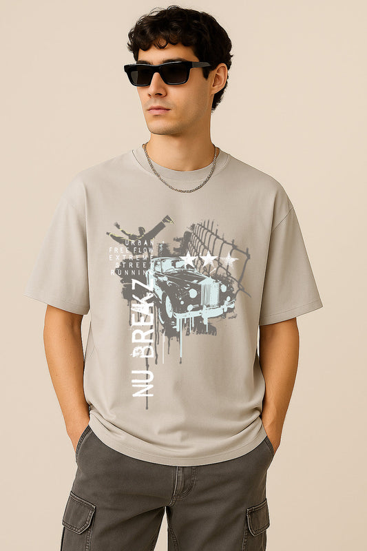 Front look of BANKAZ grey oversized grunge t shirt featuring bold car and text print