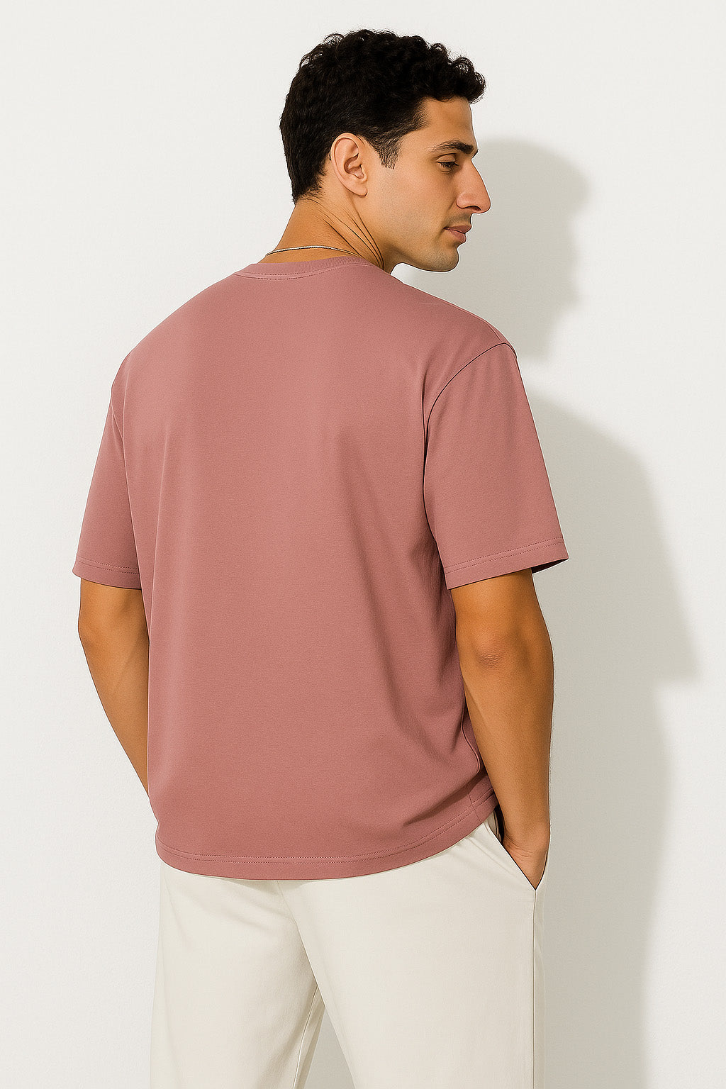 Rear view of BANKAZ grunge t shirt in pink oversized fit with plain back