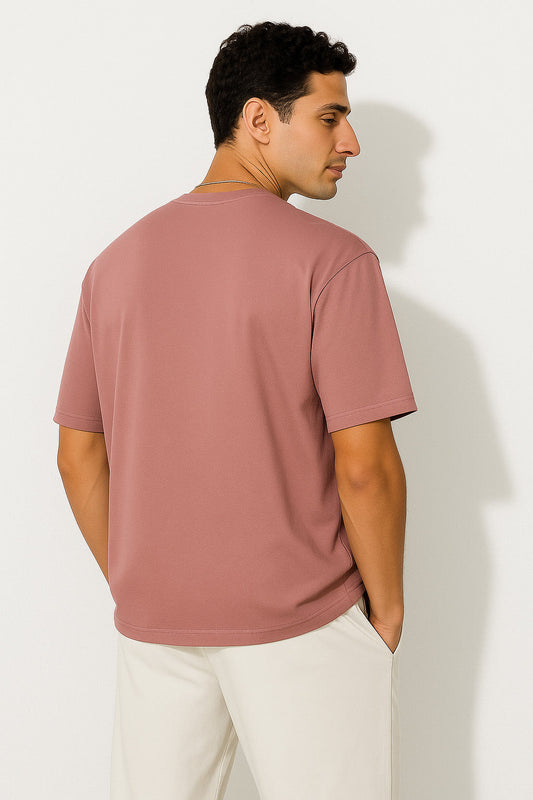Rear view of BANKAZ grunge t shirt in pink oversized fit with plain back