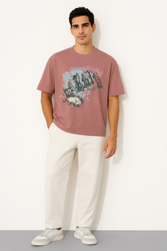 Full front view of BANKAZ pink oversized grunge t shirt featuring bold typography and artistic print