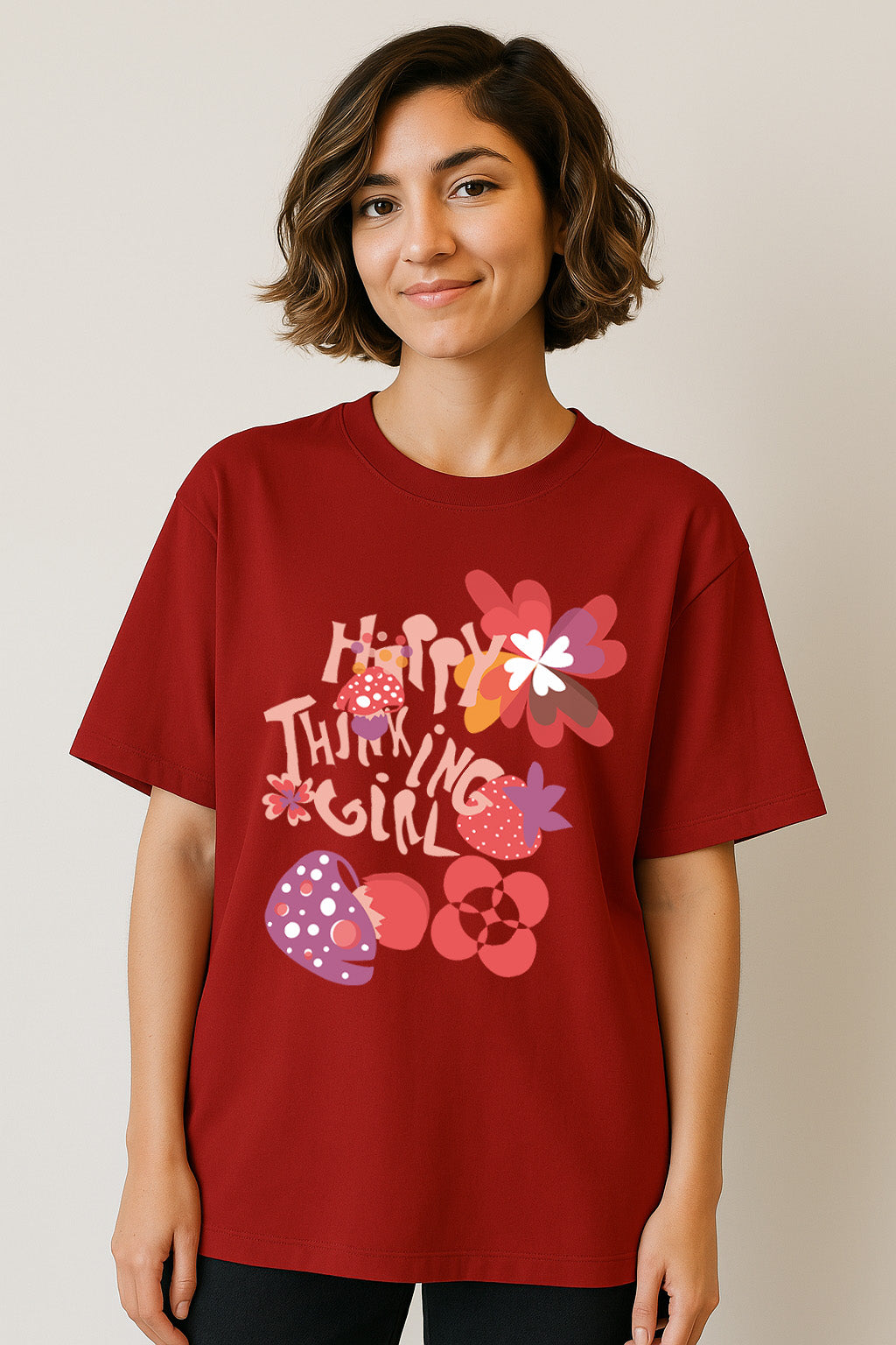 Smiling model wearing BANKAZ red oversized t-shirt – quirky happy thinking girl graphic for women
