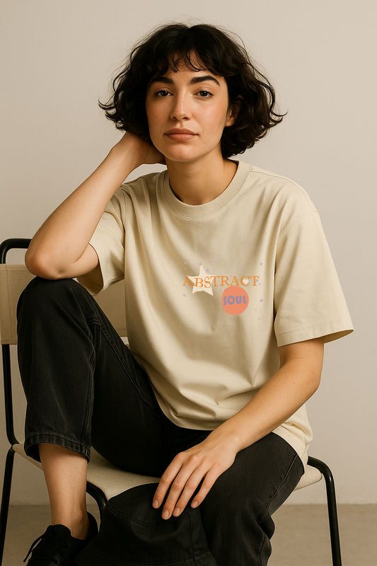 Women's cotton oversized tee in off-white with subtle front print – minimal yet expressive design