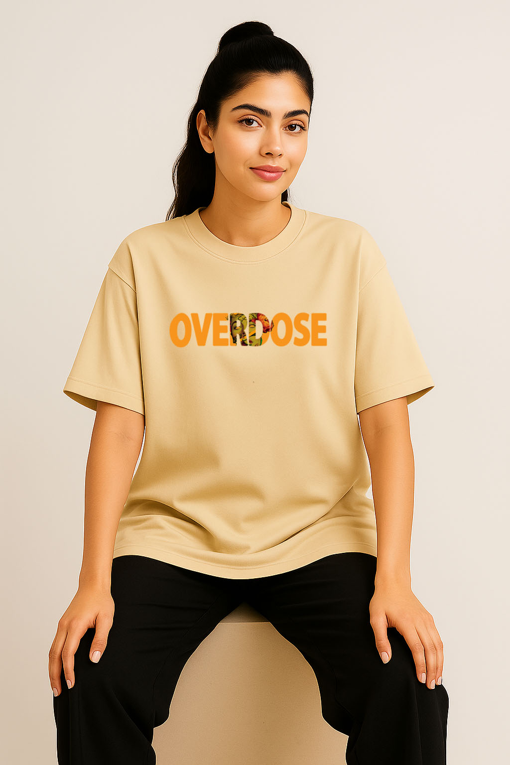 Oversized off-white t-shirt for women with “OVERDOSE” printed text on front – streetwear vibe
