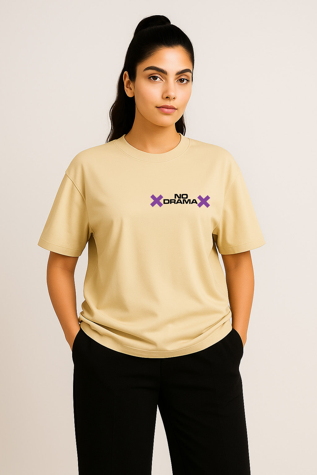 Front-facing cool view of off-white oversized women's t-shirt with purple "No Drama" chest design