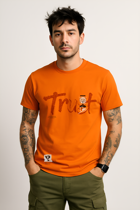 Front close-up of orange cotton t-shirt for men with bold “Trust” text design – BANKAZ regular fit tee