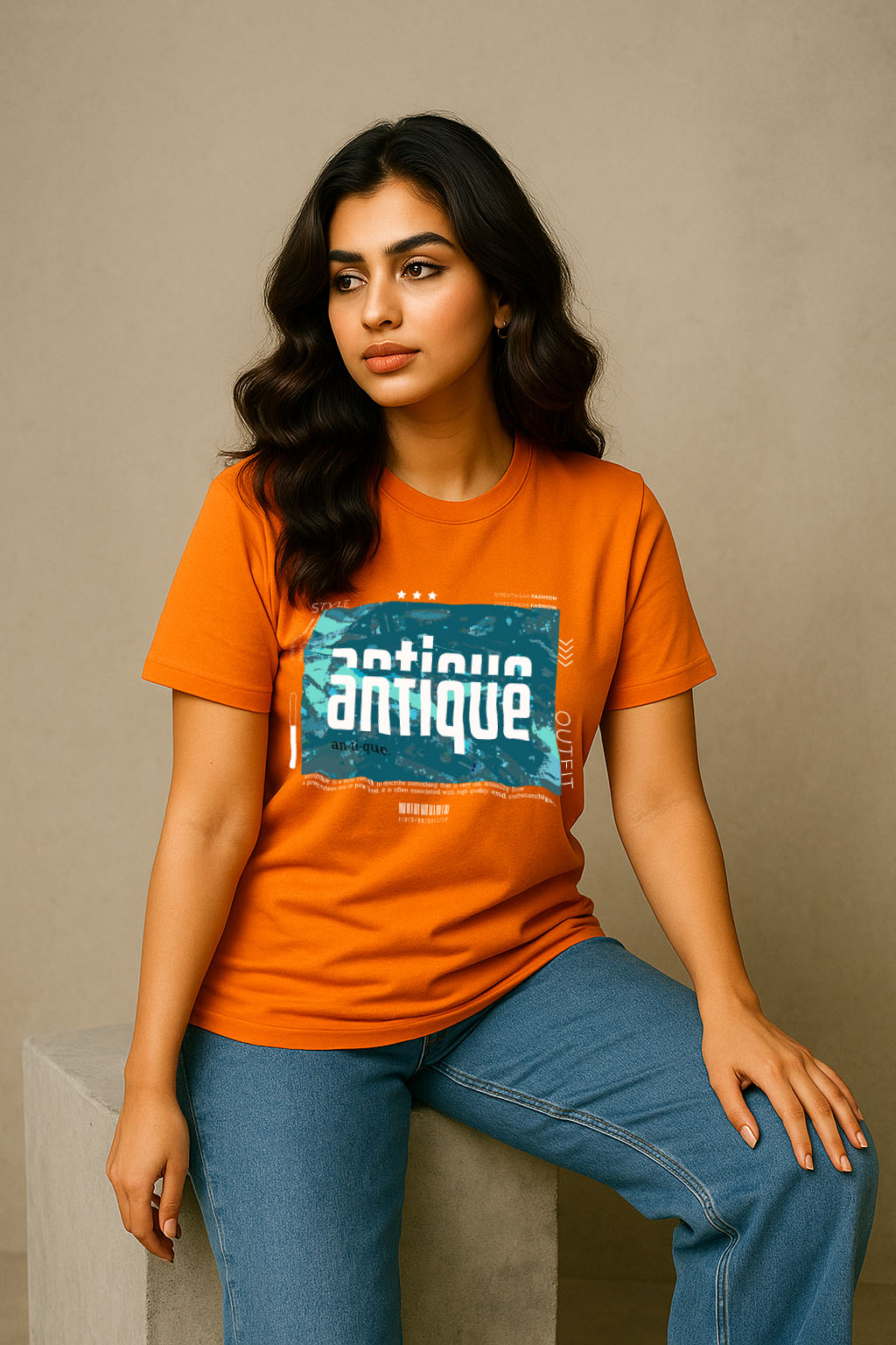 Sitting pose showing orange cotton t-shirt for women – antique design for trendy monsoon streetwear