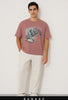 guy walking slowly in bankaz pink grunge print oversized t-shirt