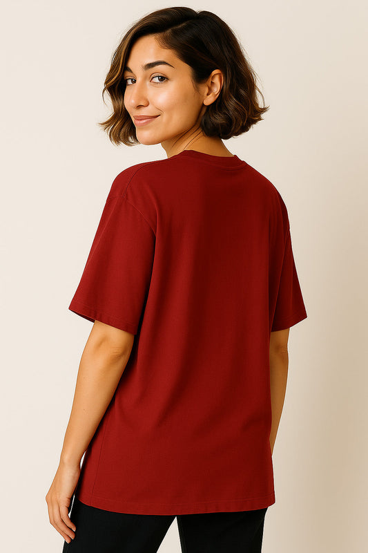 Back view of red oversized graffiti cotton t-shirt for women – minimal no-print rear style