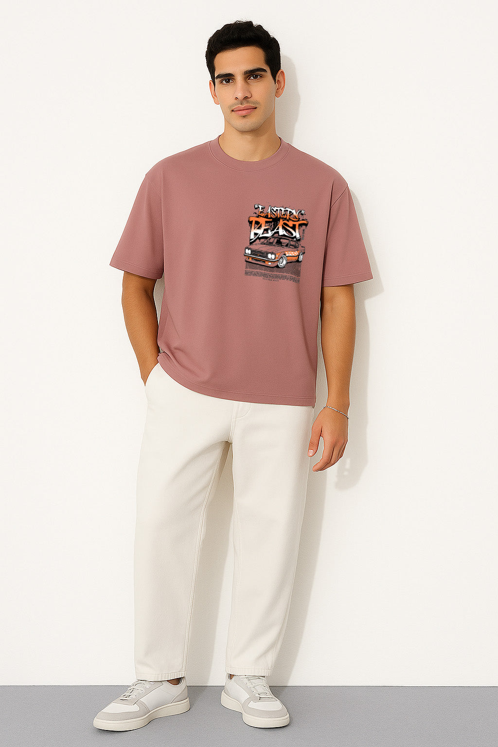 Full front view of pink oversized street racing t shirt with “Eastern Beast” race car chest print
