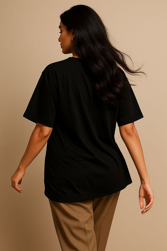 Back view of women's black oversized desi t-shirt – Hindi quote streetwear style
